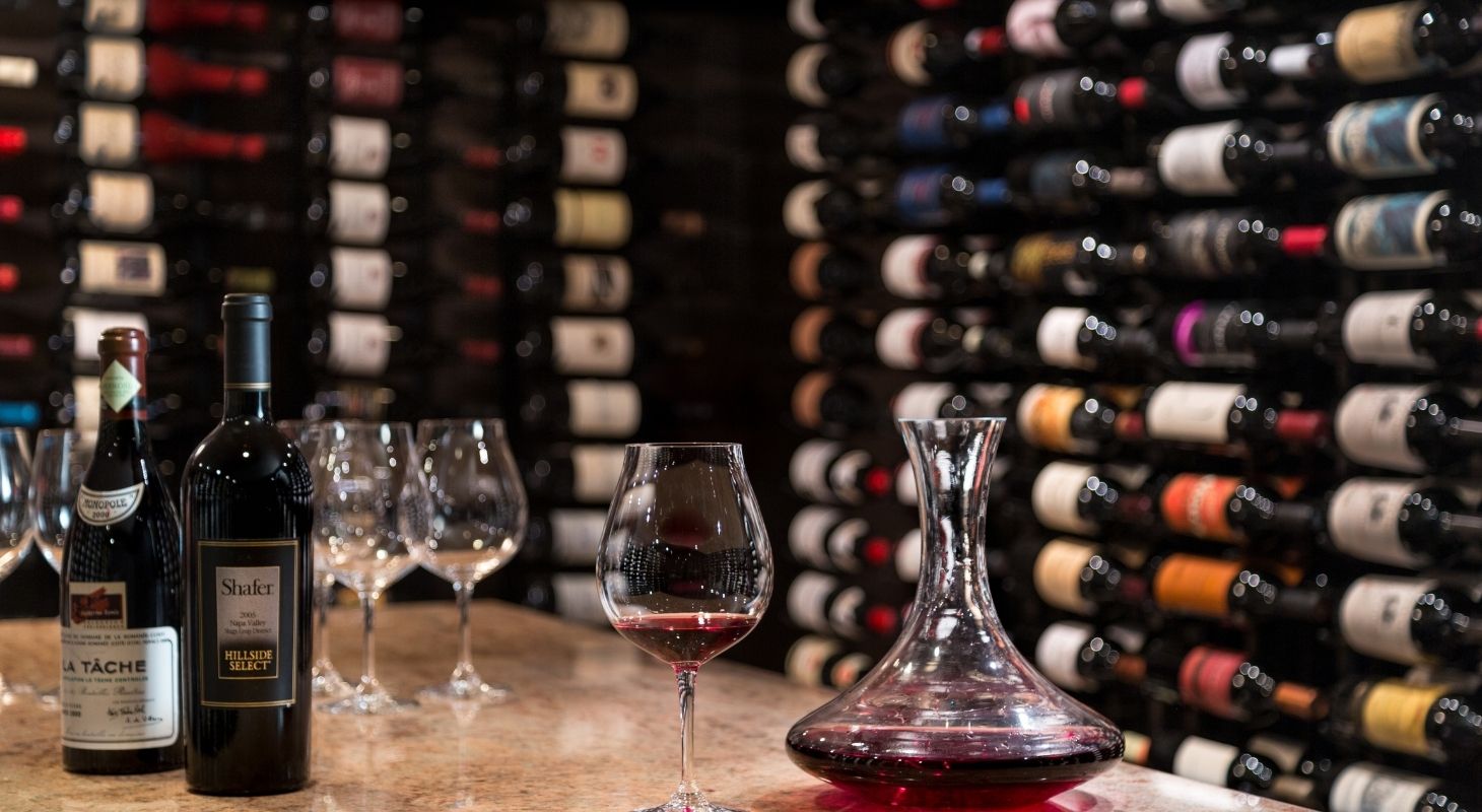 Wine cellar at Glen Gordon Manor featuring a selection of wine bottles and glasses