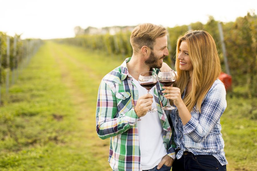 Couple enjoying wine together at a Virginia vineyard