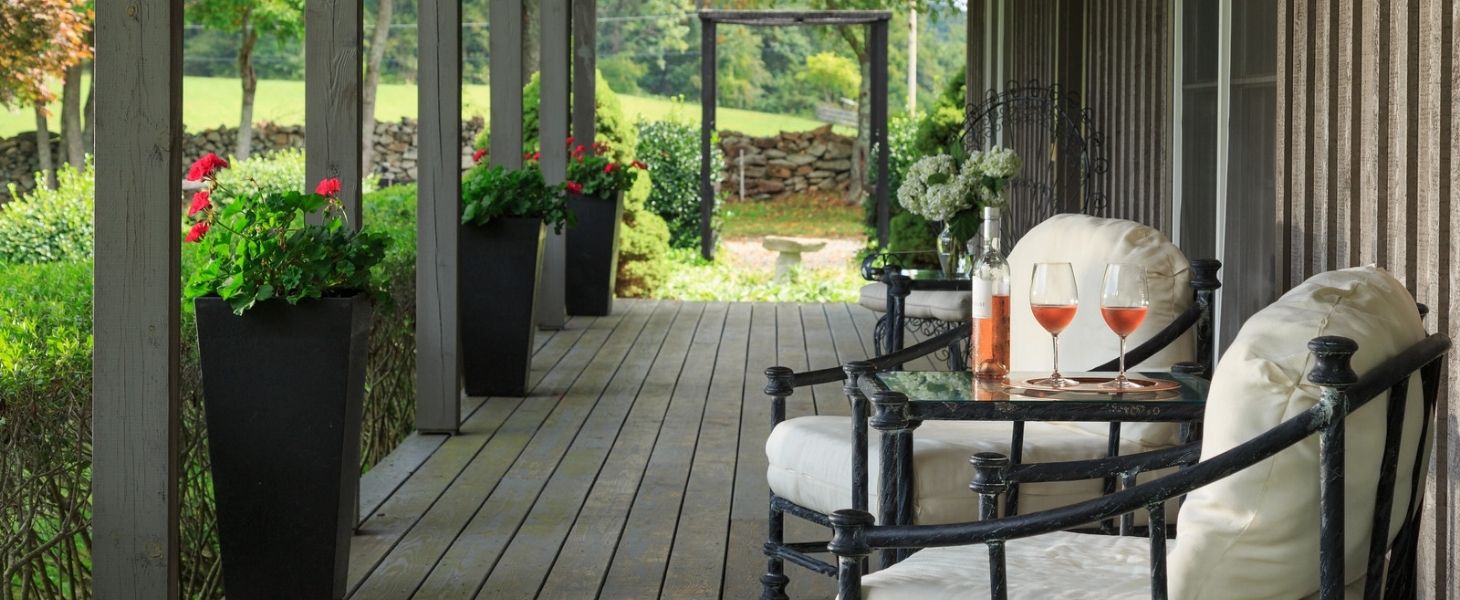 Wine glasses overlooking the grounds from Glen Gordon Manor porch