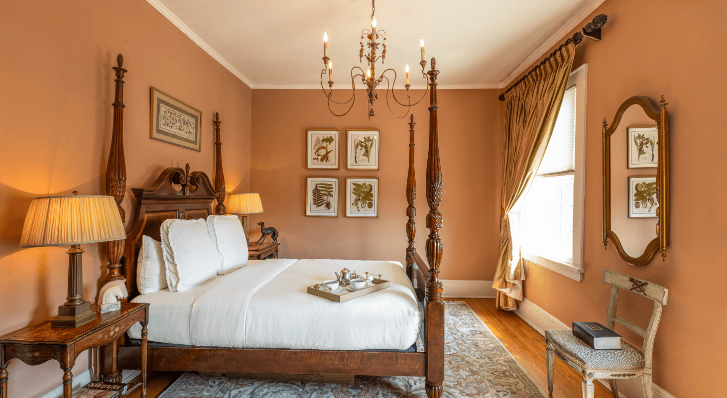 Luxurious guest room with four-poster bed