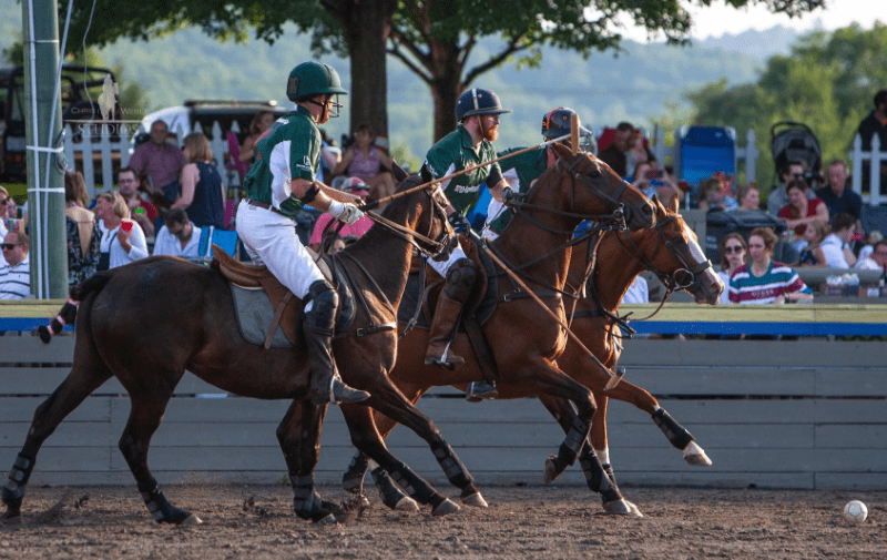 Two Players Playing Twilight Polo at Greenhill Stadium